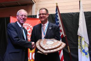 The Jack Jeakins Attendance Shield won by the club at the Conference. Trevor Sayer DG presents the trophy.